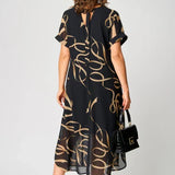 Αέρινο Φόρεμα με Γραμμικά Σχέδια και V Λαιμόκοψη