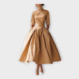 Midi φόρεμα με εκλεπτυσμένη minimal αισθητική