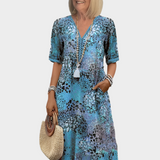 Αέρινο Φόρεμα με Καλοκαιρινό Μοτίβο και V Ντεκολτέ