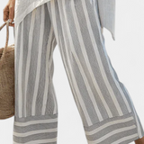 Σύνολο Daisy με Ασύμμετρη Μπλούζα και Ριγέ Παντελόνι για Μοντέρνο και Κομψό Στυλ