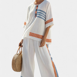 Σύνολο εθνοτικό Daisy σε λευκό με λεπτομέρειες σε μπλε και πορτοκαλί – μοναδικό και ζωντανό στυλ